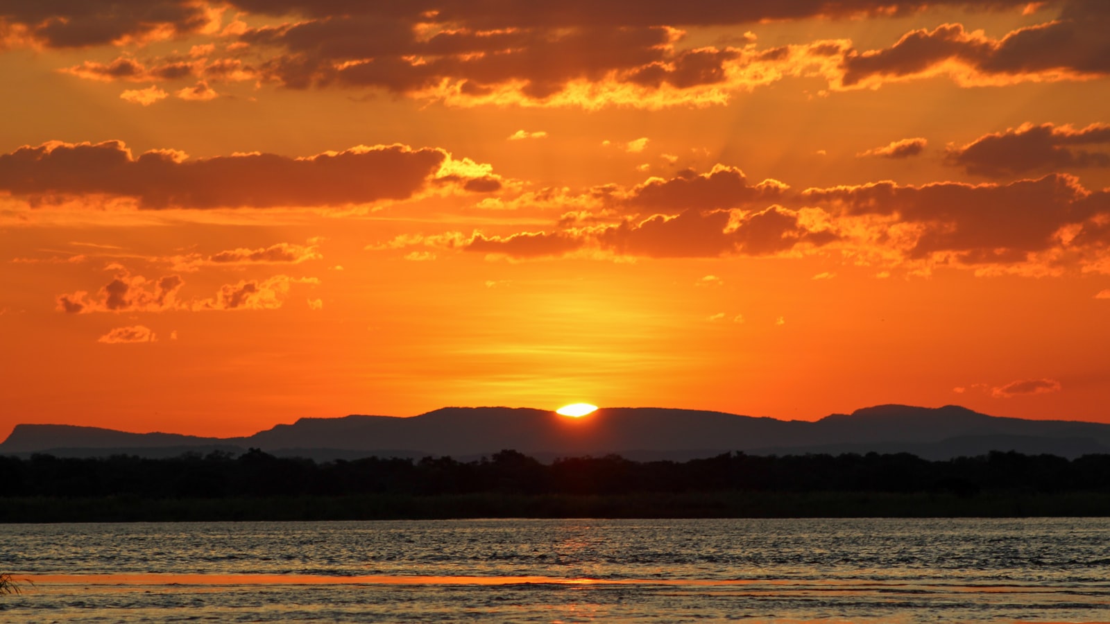 Sunset over the Zambezi River above the falls
